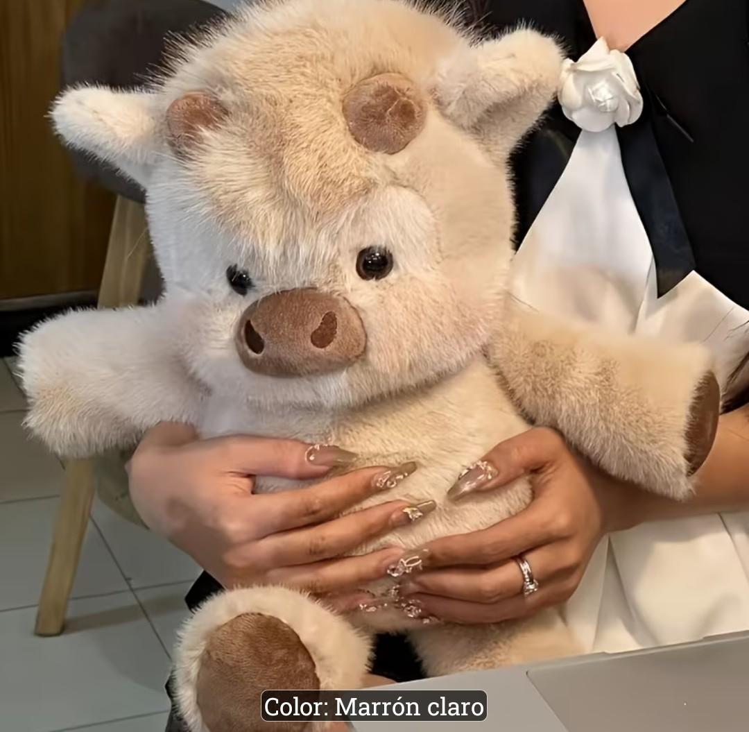 Peluche de vaca que corre